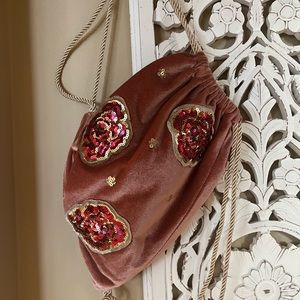 Adorable velour/sequin cinch bag for girls.